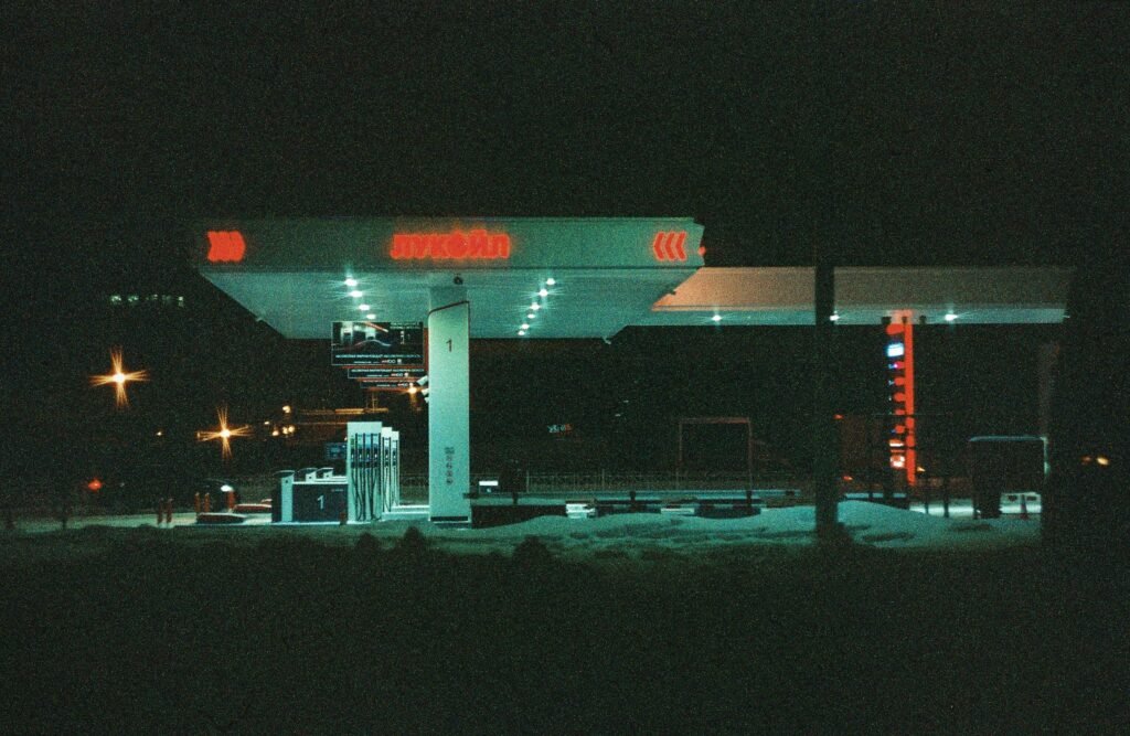Atmospheric night view of an illuminated gas station in Saint Petersburg, Russia.
